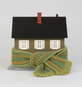 Miniature House Wrapped in Scarf