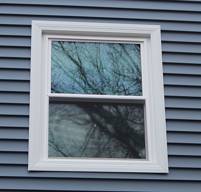 window trim with white trim and blue siding