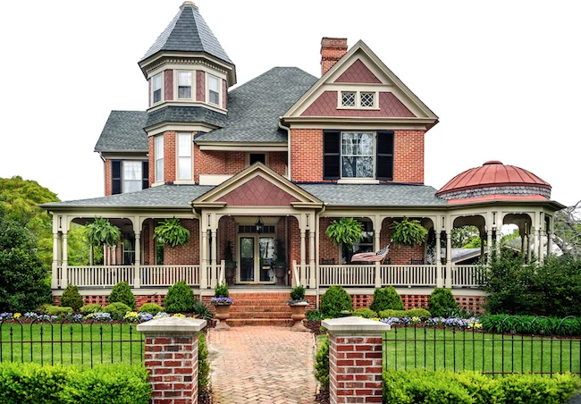 colored Victorian house style with almond windows color.